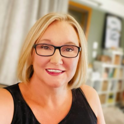 A selfie portrait of Lisa Sabin-Wilson, COO and Co-Founder of WebDevStudios. She is wearing glasses and smiling at the camera.
