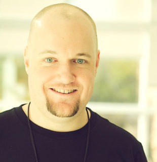Photo of Brad Williams, smiling and looking directly at camera