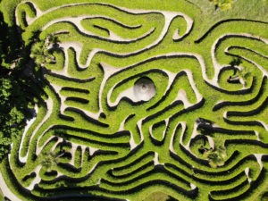 This is an overhead photograph looking down upon a large, outdoor maze.