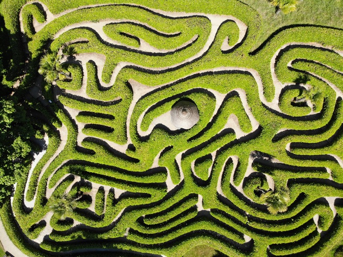 Photo image of an aerial view of an outdoor maze with green hedges used for a blog post at WebDevStudios about "13 Reasons Why It's Time for a Website Redesign."