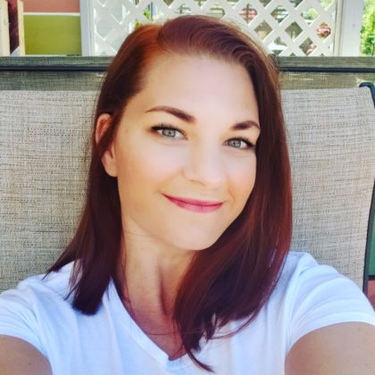 A photograph of WebDevStudios Project Manager, Katy Keilman, who is smiling at the camera.