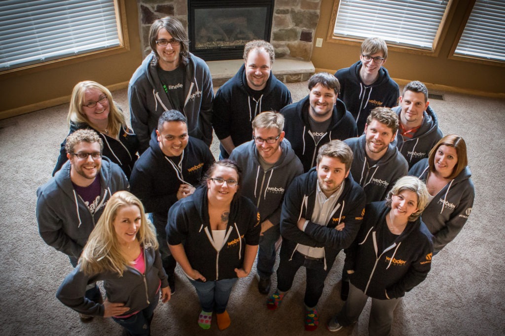 A photograph of 15 team members from website design and development agency WebDevStudios standing together and looking up at the camera for the first-ever WDS Camp company retreat.