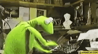 This is a GIF of Kermit D Frog typing frantically.