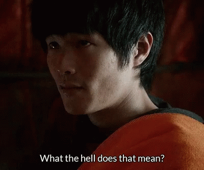 This is a GIF of a man with a confused look his face and the text on the GIF reads, "What the hell does that mean?"