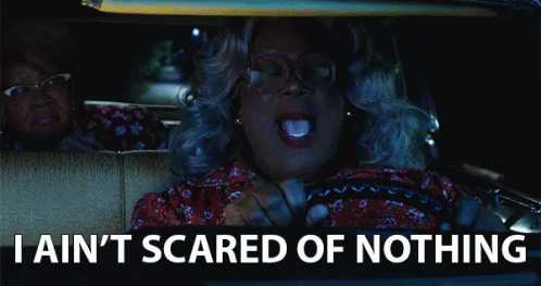 This is a GIF animated image from Boo! A Madea Halloween. The GIF features Madea driving a car saying, "I ain't scared of nothing."