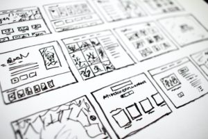 This is a story board of a series of squares and design layouts within the squares to show a plan for website pages, exemplifying the planning that goes behind a successful digital strategy.