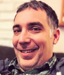 This is a selfie style portrait photo of Joel Schlotterer, WebDevStudios Lead Engineer.