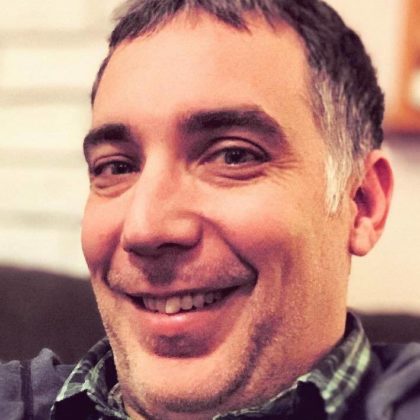 This is a selfie style portrait photo of Joel Schlotterer, WebDevStudios Lead Engineer.