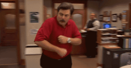 This is a GIF of Ron from the TV show Parks and Rec dancing.