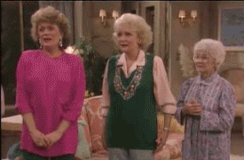 This is a GIF of the Golden Girls hugging.