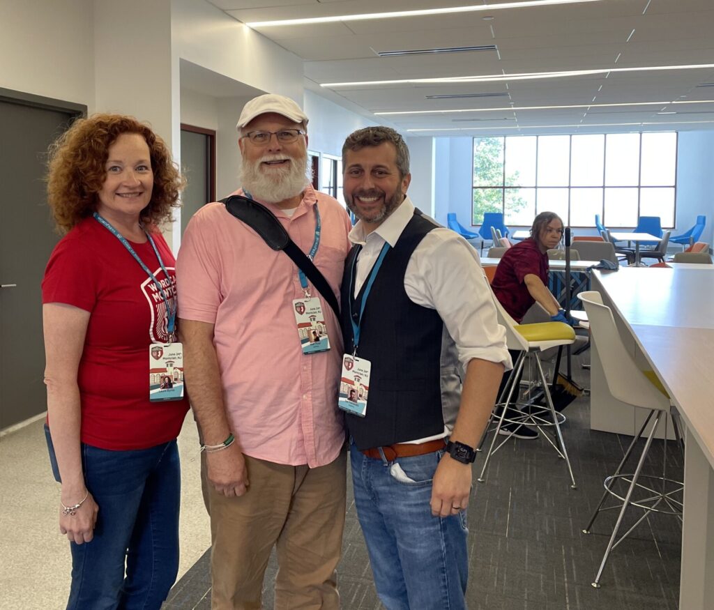 This is a group photo of WebDevStudios teammates (left to right): Laura Byrne, Matt Ryan, Sal Ferrarello. This photo was taken at WordCamp Montclair 2023.