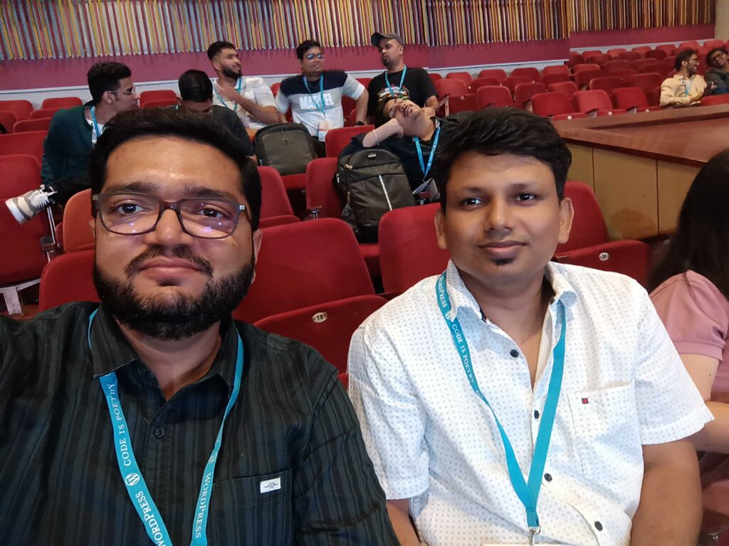 This is a selfie style photo of Frontend Engineer Aslam Doctor (on the left) and Backend Engineer Lax Mariappan at WordCamp Mumbai 2023.