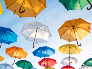 This is an image of many brightly colored umbrellas.