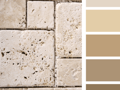 Neutral colored brick wall next to neutral colored palette.