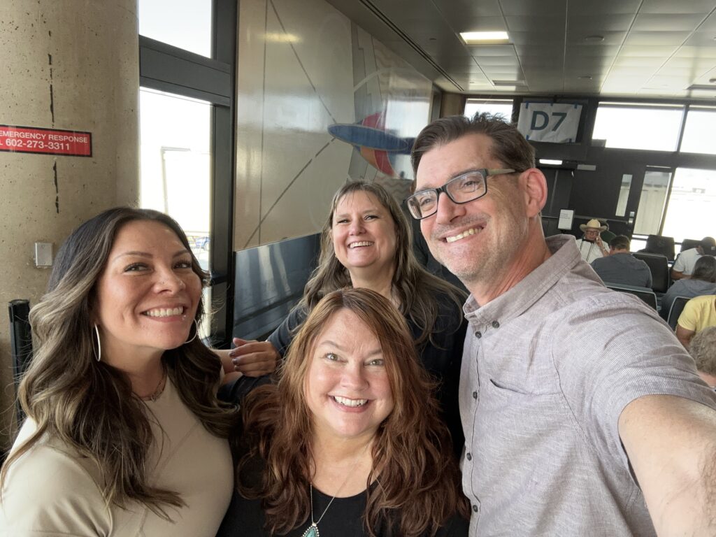 Adam Silver and Jen Miller meet at the airport to go to WCUS 2025 with Raquel and Carol Stambaugh.